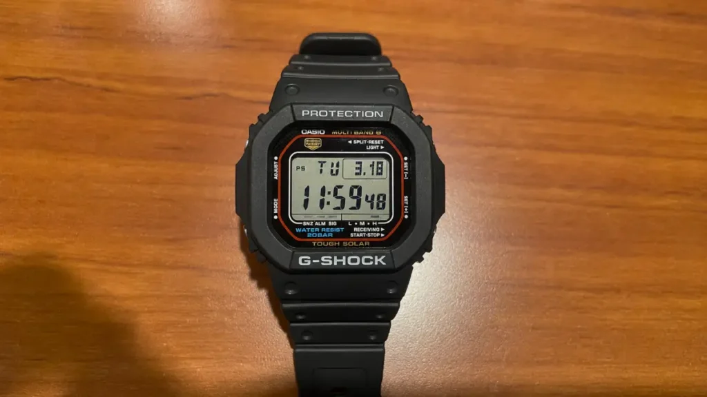 Close-up of the square G-Shock digital display and black resin bezel